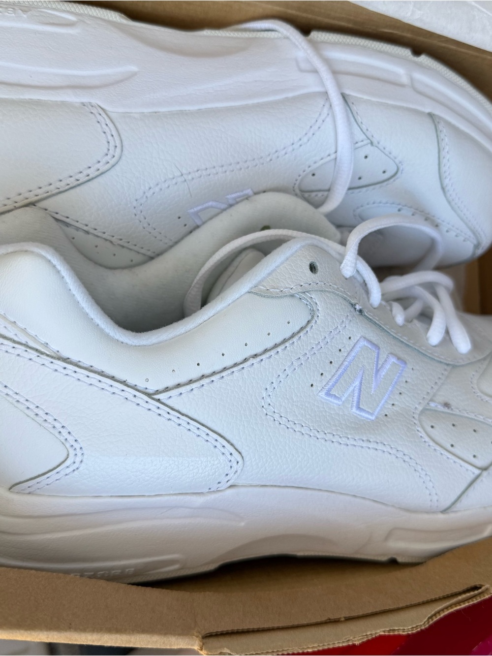 New Balance women’s  White Leather Sneakers